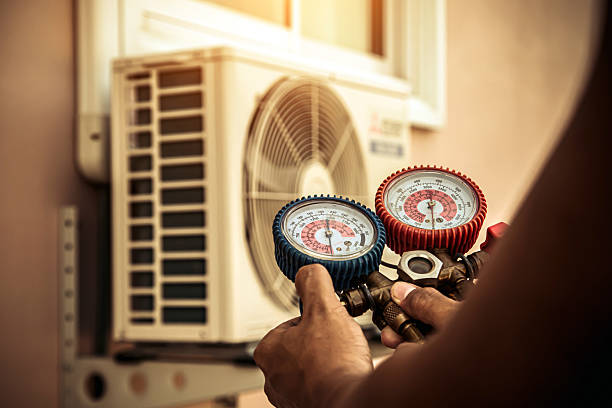 Professional Air Conditioning Service technician working in Reading, OH